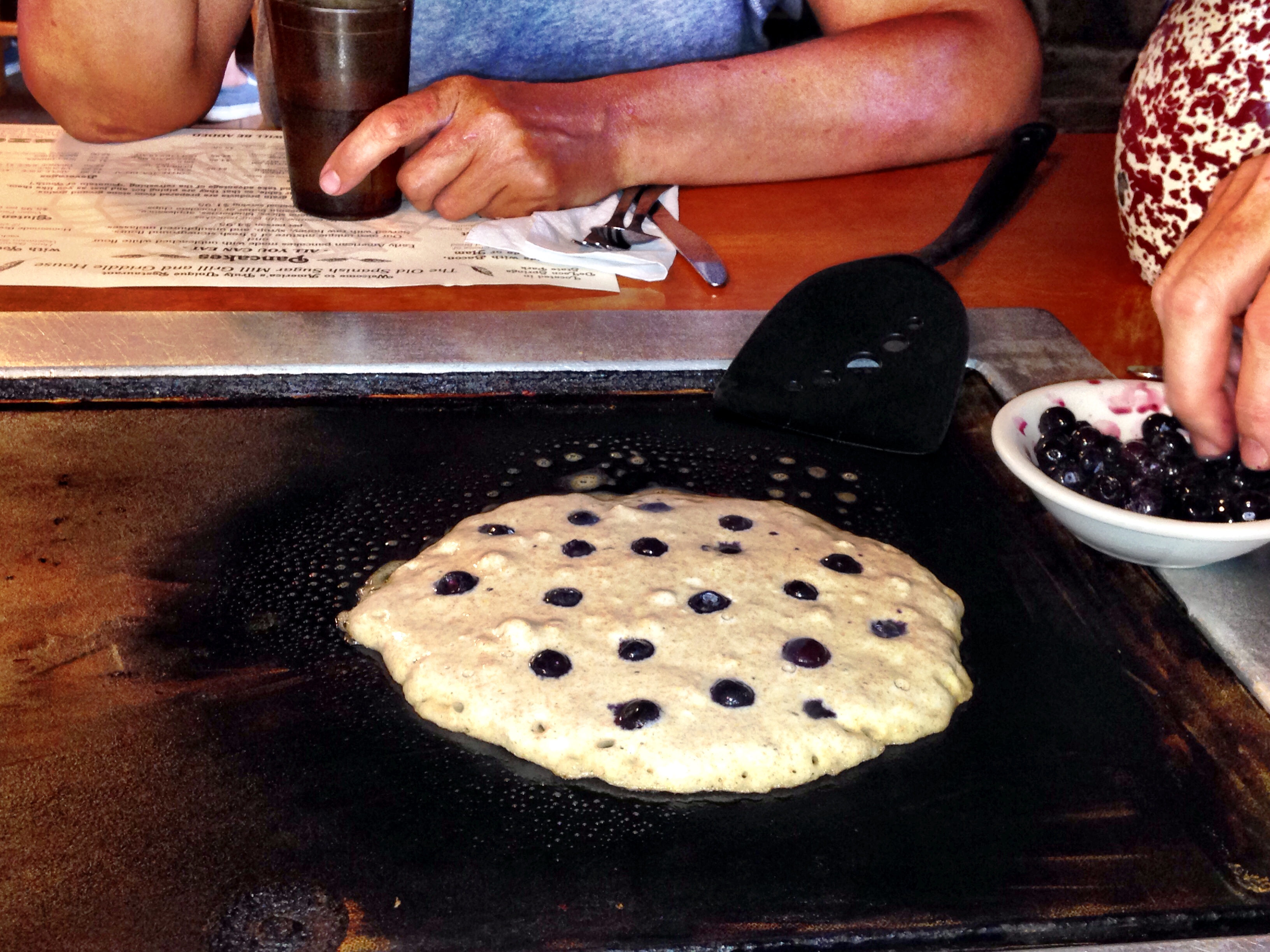 bubbling pancake with blueberries