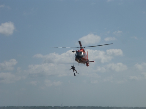 Lowering rescue swimmer